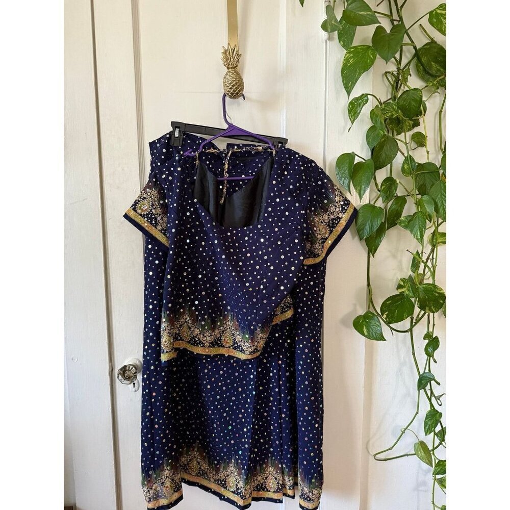 Women’s size one X – large colorful, sparkly, two-piece outfit